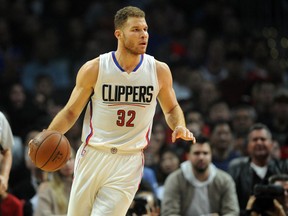 Los Angeles Clippers forward Blake Griffin (32) moves the ball against Oklahoma City Thunder during the first half  at Staples Center. Gary A. Vasquez-USA TODAY Sports