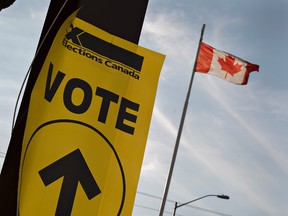 An Elections Canada sign directs voters to the entrance of the Sonnenhof German-Canadian Club on Monday October 19, 2015, one of several voting locations in Brantford, Ontario. (Brian Thompson/Brantford Expositor/Postmedia Network)