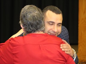 The Rev. Majed El Shafie greeting students and staff after his moving speech about his life and how he fights for freedom.