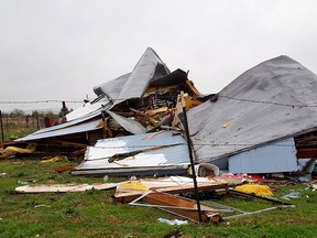 This Sunday, Dec. 27, 2015 photo shows damage to the home where Daniel and Zuleyma Santillano lived with their newborn and three older children in Blue Ridge, Texas, north of Dallas. The Santillano's newborn was killed when the home was destroyed by a tornado Saturday night.  (AP Photo/Reese Dunklin)