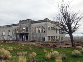 In this undated photo provided by the U.S. Department of Energy, the ruins of the old Hanford High School are shown near Richland, Wash. The towns of Hanford and White Bluffs were evacuated to make room for the Hanford Nuclear Reservation, which made the plutonium for the atomic bomb dropped on Nagasaki, Japan, and the ruins of the high school and other buildings are now part of the nation's newest national park, called the Manhattan Project National Historic Park. (Courtesy of the U.S. Department of Energy via AP)
