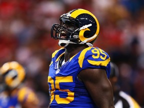 William Hayes #95 of the St. Louis Rams reacts in the second quarter against the San Francisco 49ers at Edward Jones Dome on October 13, 2014 in St Louis, Missouri.   Dilip Vishwanat/Getty Images/AFP