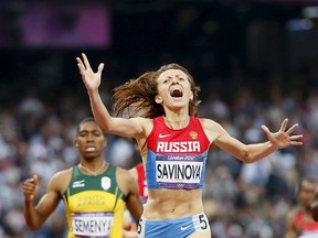 The World Anti-Doping Agency commission in November alleged that Russian athletes have systematically used performance-enhancing substances and recommended Russia be suspended from international competition. If endorsed by the International Athletics Federation (IAAF), the proposal could see Russian athletes excluded from next year's Olympic games in Brazil. Pictured: Russia's Mariya Savinova winning the 800m final at the London 2012 Olympic Games, August 11, 2012.  REUTERS/Lucy Nicholson