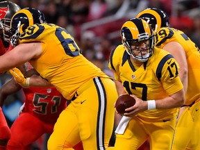 St. Louis Rams quarterback Case Keenum (17) drops back on a play in the game against the Tampa Bay Buccaneers during the second half at the Edward Jones Dome. Jasen Vinlove-USA TODAY Sports