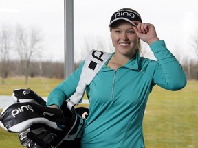 Brooke Henderson poses for a photo at the Smiths Falls Golf Club on Monday, December 21, 2015. THE CANADIAN PRESS/ Patrick Doyle