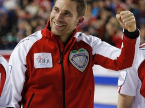 Team Canada John Morris after winning the 2015 Tim Hortons Brier against Team Northern Ontario in Calgary, Alta. on Sunday March 8, 2015. Al Charest/Calgary Sun/QMI Agency