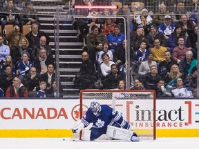 Toronto Maple Leafs goalie Jonathan Bernier reacts after New York Islanders' Anders Lee scored his team's sixth goal during second-period NHL hockey at the Air Canada Centre in Toronto on Dec. 29, 2015. (THE CANADIAN PRESS/Chris Young)