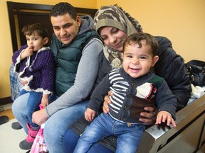 Syrian refugees Mohammad Al Amour and Shoroq Abo Arah with their children Aya and Rasheed at the Cross Cultural Learning Centre where they are beginning a new chapter of their  lives in London, Ont. on Tuesday December 29, 2015. (DEREK RUTTAN, The London Free Press file photo)