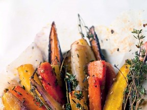 Roasted carrots accompanied by honey, garlic, thyme and coriander from chefs Yotam Ottolenghi and Ramael Scully from their new cookbook "Nopi" is shown in this undated handout photo. THE CANADIAN PRESS/HO - Appetite by Random House, Jonathan Lovekin