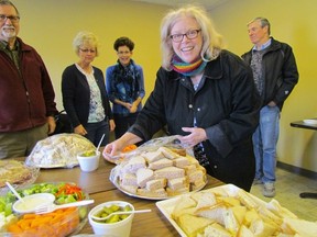 Barb Bancroft, and other volunteers with Trinity Anglican Church, get lunch ready for evacuees of the downtown Sarnia high-rise apartment building, Kenwick Place, on Nov. 23 at the Comfort Inn in Point Edward. Several tenants of the building were being temporarily sheltered at two local motels after a fire Sunday forced them to leave the apartment building. (File photo/ Postmedia Network)