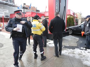 Police investigate a beating at Lola Rd. and Yonge St., south of Eglinton Ave., on Wednesday, Dec. 30, 2015. (CRAIG ROBERTSON/Toronto Sun)