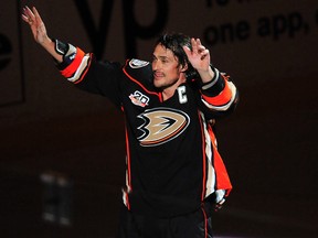 Anaheim Ducks forward Teemu Selanne (8) skates a lap after a win over the Colorado Avalanche at Honda Center. (Gary A. Vasquez/USA TODAY Sports)