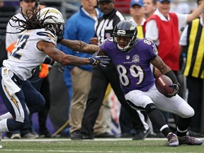 Wide receiver Steve Smith of the Baltimore Ravens eludes cornerback Jason Verrett of the San Diego Chargers during the second half at M&T Bank Stadium in Baltimore on Nov. 1, 2015. (Patrick Smith/Getty Images/AFP)