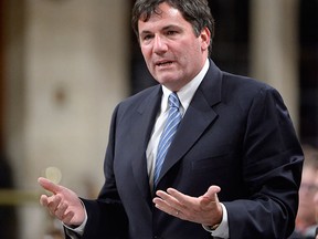 Government House Leader Dominic LeBlanc answers a question during question period in the House of Commons on Parliament Hill in Ottawa, on Wednesday, Dec. 9, 2015. THE CANADIAN PRESS/Adrian Wyld