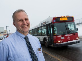 OC Transpo bus driver Carlo DiFelice has had a video of himself assisting passengers get on his bus through heavy snow go viral on social media. Wednesday December 30, 2015. Errol McGihon/Ottawa Sun/Postmedia Network
