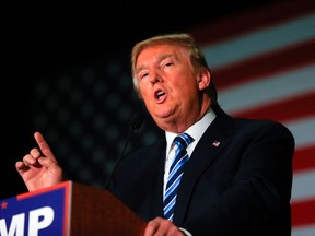 Republican presidential candidate Donald Trump speaks during a campaign stop in Council Bluffs, Iowa, on Dec. 29, 2015. (AP Photo/Nati Harnik)