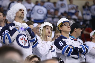 2015 YEAR IN REVIEW � Winnipeg Jets fans look on late in the third period of a 5-2 loss to the Anaheim Ducks during NHL playoff action in Winnipeg on Wed., April 22, 2015. Kevin King/Winnipeg Sun/Postmedia Network