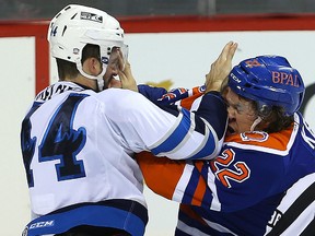 Manitoba Moose defenceman Julian Melchiori (l) and Bakersfield Condors left winger Kale Kessy fight during AHL hockey in Winnipeg, Man. Sunday November 22, 2015.
Brian Donogh/Winnipeg Sun/Postmedia Network