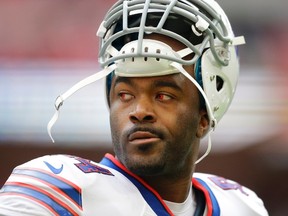 Buffalo Bills defensive end Mario Williams (94) stands on the field during the warm-up before a game against the Jacksonville Jaguars at Wembley Stadium in London Sunday, Oct. 25, 2015. (AP Photo/Matt Dunham)