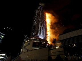 A fire engulfs The Address Hotel in downtown Dubai in the United Arab Emirates December 31, 2015. REUTERS/Ahmed Jadallah