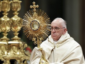 Pope Francis leads the First Vespers and Te Deum prayers in Saint Peter's Basilica at the Vatican on Dec. 31, 2015. (REUTERS/Max Rossi)