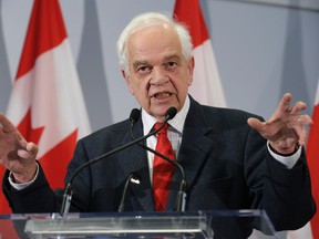 Immigration Minister John McCallum updates the media on Canada's efforts to settle Syrian refugees. (Craig Robertson/Toronto Sun/Postmedia Network)