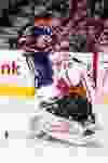 Edmonton defenceman Darnell Nurse (25) bounces a shot off Anaheim goaltender John Gibson (36) during the second period of a NHL game between the Edmonton Oilers and the Anaheim Ducks at Rexall Place in Edmonton, Alta. on Thursday December 31, 2015. Ian Kucerak/Edmonton Sun/Postmedia Network