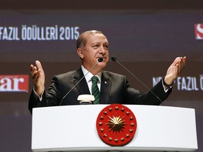 Turkish President Tayyip Erdogan speaks during a ceremony for the literary awards named after late poet Necip Fazil Kisakurek, in Istanbul, on Dec. 25, 2015. (Basin Bulbul, Presidential Press Service Pool via AP)