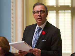 Quebec Labour Minister Sam Hamad presents a bill at the Quebec legislature, Tuesday Nov. 10, 2015. THE CANADIAN PRESS/Clement Allard