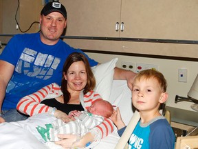 JASON MILLER/THE INTELLIGENCER
Mason, the newest member of the Pigden family (pictured here with his father, Charles, mother; Nitasha and older brother Ryker), also holds bragging rights for being the first Belleville baby of 2016. Mason weighed in at eight pounds and four ounces. He was born at around 8:30 a.m., just about two hours before William Kennedy (seven pounds, five ounces) who was the second baby born at the break of 2016.