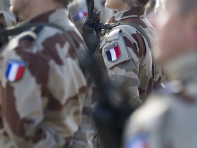 French soldiers stand at an army base, where French army aircraft are based, in Jordan, January 1, 2016. (REUTERS/Kenzo Tribouillard/Pool)