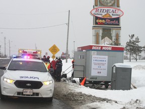 Police and paramedics were called to the OLG Slots at Rideau Carleton Raceway after locked-out workers, handing out pamphlets as part of an information picket, reported being struck by cars they had tried to  stop, Friday, Jan. 1, 2016. Unionized slots workers have been handing out information about their labour dispute with Ontario Lottery and Gaming since they were locked out Dec. 15. 
Corey Larocque/Ottawa Sun