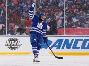 Toronto Maple Leafs center Tyler Bozak celebrates after scoring the game-winning goal in the shootout of the Winter Classic against the Detroit Red Wings at Michigan Stadium in Ann Arbor, Mich., on Jan. 1, 2014. (Rick Osentoski/USA TODAY Sports)