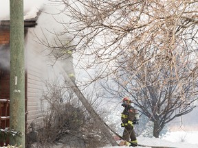 Mary Katherine Keown/The Sudbury Star
Three people escaped without injury and one of them had to be evacuated from a house on Talon Road in Val Therese where fire caused about $250,000 damage.