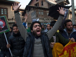 A Kashmiri Shiite Muslim man shouts slogans against the execution of Sheikh Nimr al-Nimr, during a protest in Srinagar, Indian controlled Kashmir, on Jan. 2, 2016. Hundreds of Shiite Muslims in Indian portion of Kashmiri rallied in the Shia dominated areas protesting against Saudi Arabia, after they announced on Saturday it had executed 47 prisoners convicted of terrorism charges, including al-Qaida detainees and a prominent Shiite cleric who rallied protests against the government. (AP Photo/Dar Yasin)