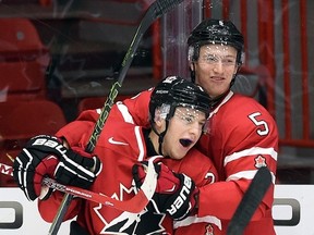 Canada's Joe Hicketts celebrates his second-period goal against Switzerland during a world junior championship game in Helsinki on Dec. 29, 2015. (THE CANADIAN PRESS/Sean Kilpatrick)