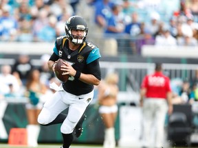 Jacksonville Jaguars quarterback Blake Bortles rolls out to pass against the Indianapolis Colts in the first quarter at EverBank Field in Jacksonville on Dec. 13, 2015. (Jim Steve/USA TODAY Sports)