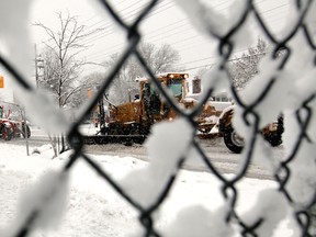 Ottawa snow plows are shown working on Smyth Road after one of the city's major snowstorms.
Tony Caldwell/Ottawa Sun files.