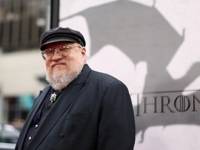 In this March 18, 2013, file photo, author George R.R. Martin arrives at the premiere for the third season of the HBO television series "Game of Thrones" at the TCL Chinese Theatre in Los Angeles. In a Jan 2, 2016, blog entry, Martin acknowledges he missed the Dec. 31 deadline for the latest book in the "Game of Thrones" fantasy series, titled “The Winds of Winter,” and the finished novel is still months away. “Game of Thrones,” the HBO television season based on the novel will start airing in April 2016, while he’s still writing.  (Photo by Matt Sayles /Invision/AP, File)