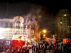 Flames rise from Saudi Arabia's embassy during a demonstration in Tehran January 2, 2016. Iranian protesters stormed the Saudi Embassy in Tehran early on Sunday morning as Shi'ite Muslim Iran reacted with fury to Saudi Arabia's execution of a prominent Shi'ite cleric. REUTERS/TIMA/Mehdi Ghasemi/ISNA