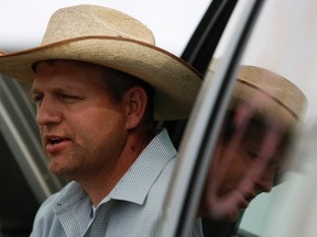 Ammon Bundy, son of rancher Cliven Bundy, talks about being tasered in Bunkerville, Nevada, April 11, 2014. REUTERS/Jim Urquhart/Files