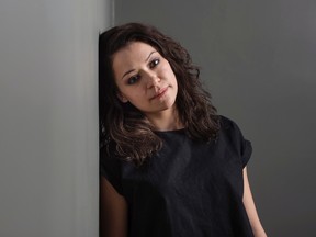Actress Tatiana Maslany poses on the set of Orphan Black in Toronto on Monday, November 23, 2015. (THE CANADIAN PRESS/Darren Calabrese)