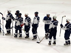 Woodstock Navy Vets alumni congratulate one another after the game during the Midwestern Junior Hockey League All-Star game between the league all-stars and the Woodstock Navy Vets alumni team in Woodstock, Ont. on Saturday January 2, 2016. The MHL All-Star team defeated the Navy Vets alumni 5-4 in a shootout with Justin Salt being the Navy Vets player of the game and New Hamburg Firebirds Jerry Ennett the league all-star player of the game. Greg Colgan/Woodstock Sentinel-Review/Postmedia Network