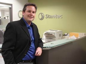 Jeff Paul, 46, shown here in Stantec?s Queens Avenue office, studied civil engineering at Western University and graduated into a recession-ravaged economy. (DALE CARRUTHERS/THE LONDON FREE PRESS)