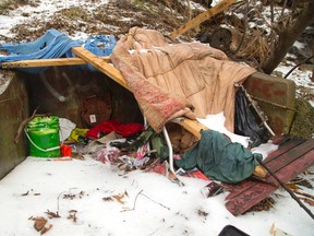 Homeless shelter built around what appears to be a storm sewer or drain outlet on the south branch of the Thames River in London, Ont. on Tuesday December 29, 2015. (MIKE HENSEN, The London Free Press)