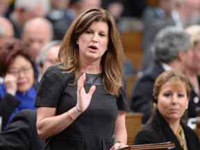 Opposition Leader Rona Ambrose asks a question during question period in the House of Commons on Parliament Hill in Ottawa, on Wednesday, Dec. 9, 2015. Ambrose says Donald Trump may be running to be the presidential candidate for the American right but his views aren't welcome in Canada's right.THE CANADIAN PRESS/Adrian Wyld