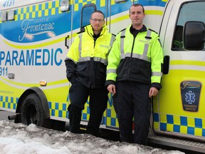Paramedics Morgan Roberts, left, and Shawn Phillips at the Frontenac Paramedic Services Palace Road station. (Steph Crosier/The Whig-Standard)
