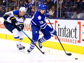 Maple Leafs forward Joffrey Lupul skates away from Jay Bouwmeester of the St. Louis Blues at the ACC on Jan. 2, 2016. (DAVE ABEL/Toronto Sun)