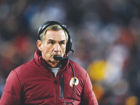 Head coach Mike Shanahan of the Washington Redskins looks on during the fourth quarter of their game against the Dallas Cowboys at FedExField on December 30, 2012 in Landover, Maryland.   Patrick McDermott/Getty Images/AFP