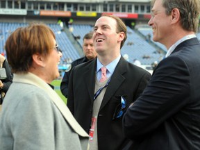 Tennessee Titans owners Amy Adams Strunk and Kenneth S. Adams IV talk with general manager Ruston Webster (middle) prior to the game against the Jacksonville Jaguars at Nissan Stadium. (Christopher Hanewinckel/USA TODAY Sports)The